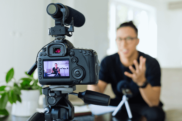 Young man making a video blog